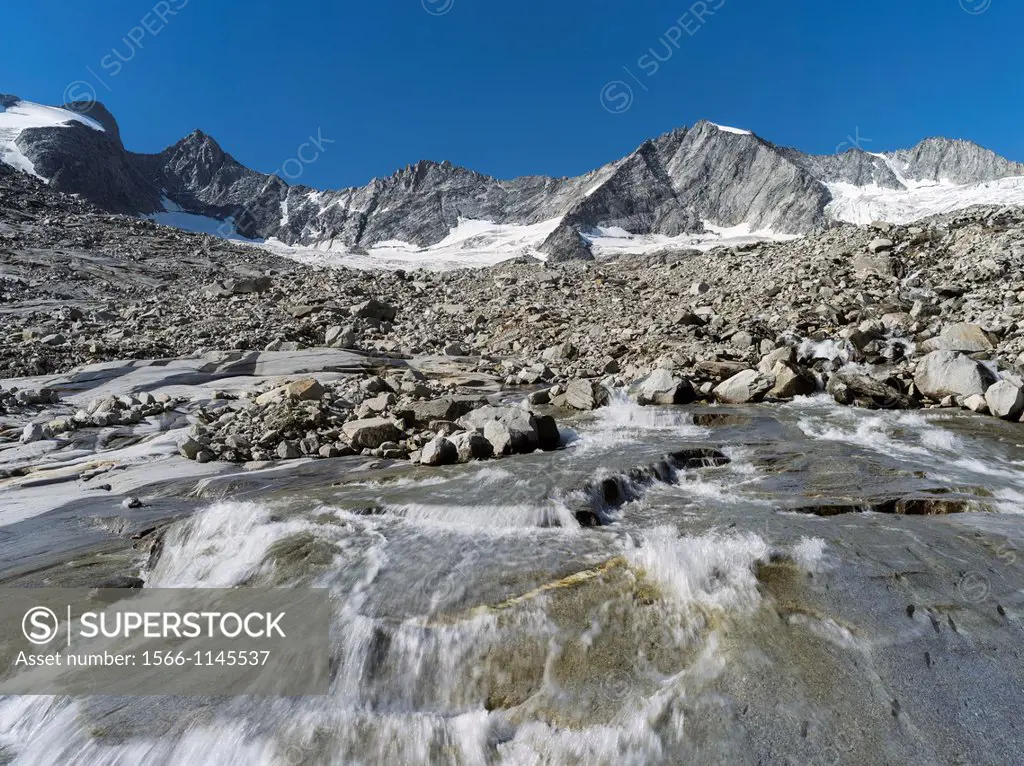 The Reichenspitz Mountain Range in the Zillertal Alps in the National Park Hohe Tauern  Glacial torrent of the glacier Wildgerlos Kees , Mount Gabler,...