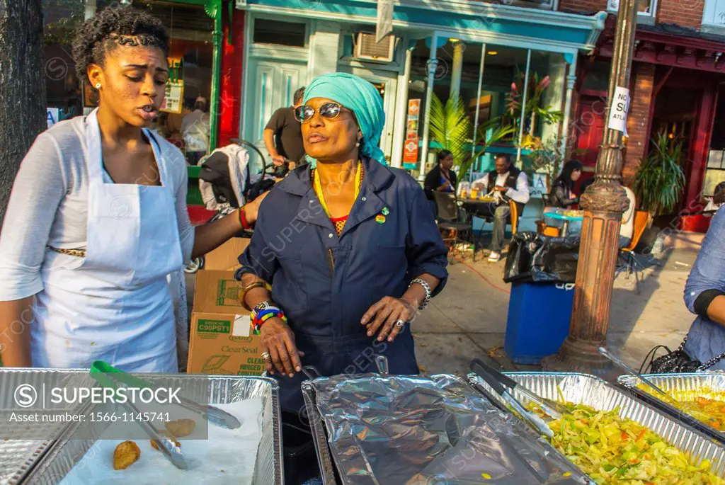 New York City, USA, African American Women Working at African Food Stall, at the Brooklyn Street Festival, ´Atlantic Antic´,
