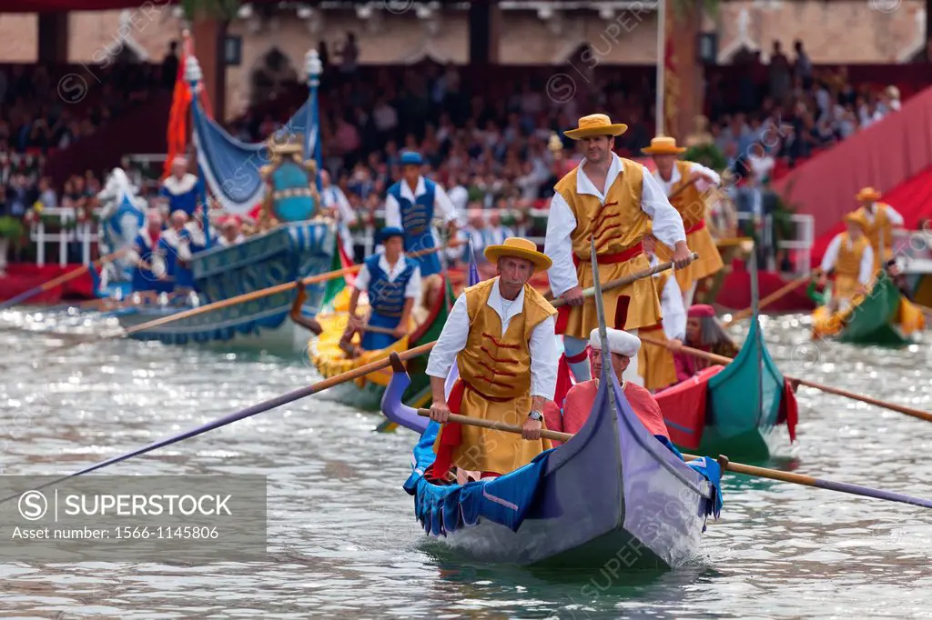 Traditional boats and dresses during the pageant preceding the 2012 Regata Storica, Venice, Italy, Europe