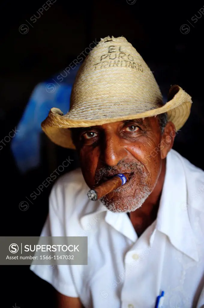 Cuban man smoking a cigar in Trinidad,Sancti Spiritus Province,Cuba