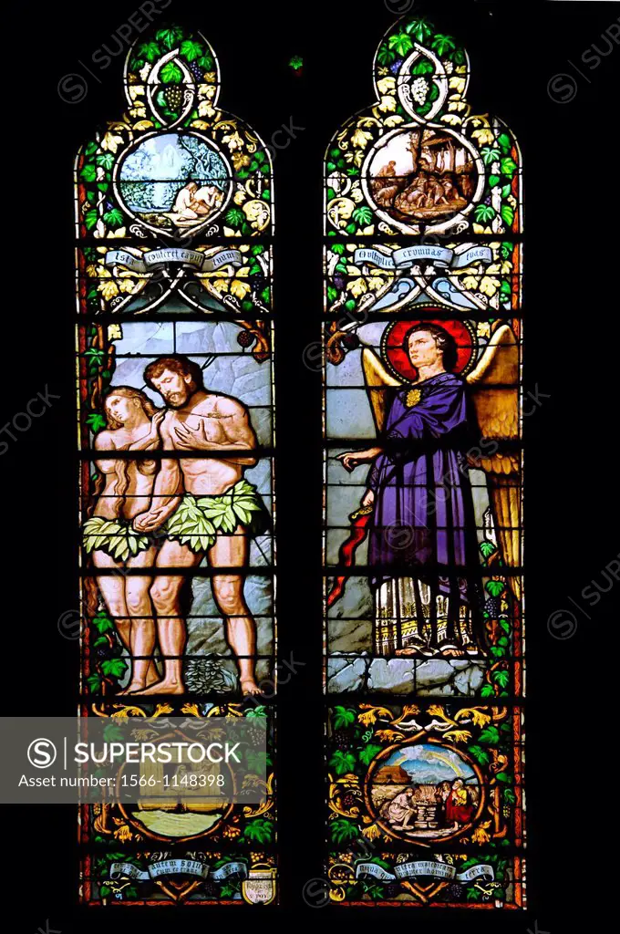 19th century stained-glass window depicting Adam and Eve troughed out of the Eden Garden, at Notre Dame church, Sainte-Foy-la-Grande, Gironde, Aquitai...