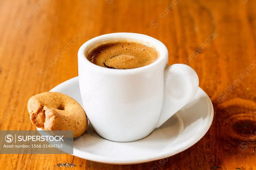 A cup of greek coffee with cookie. Stemnitsa, Arcadia, Peloponnese, Greece.