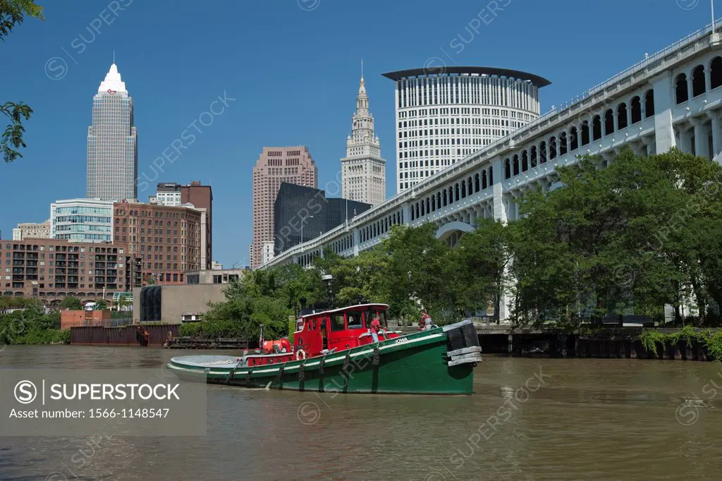 Tug Boat Cuyahoga River At Settlers Landing Park Downtown Skyline Cleveland Ohio USA