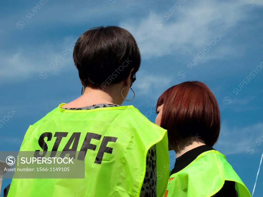 women wearing staff vest at event outdoors
