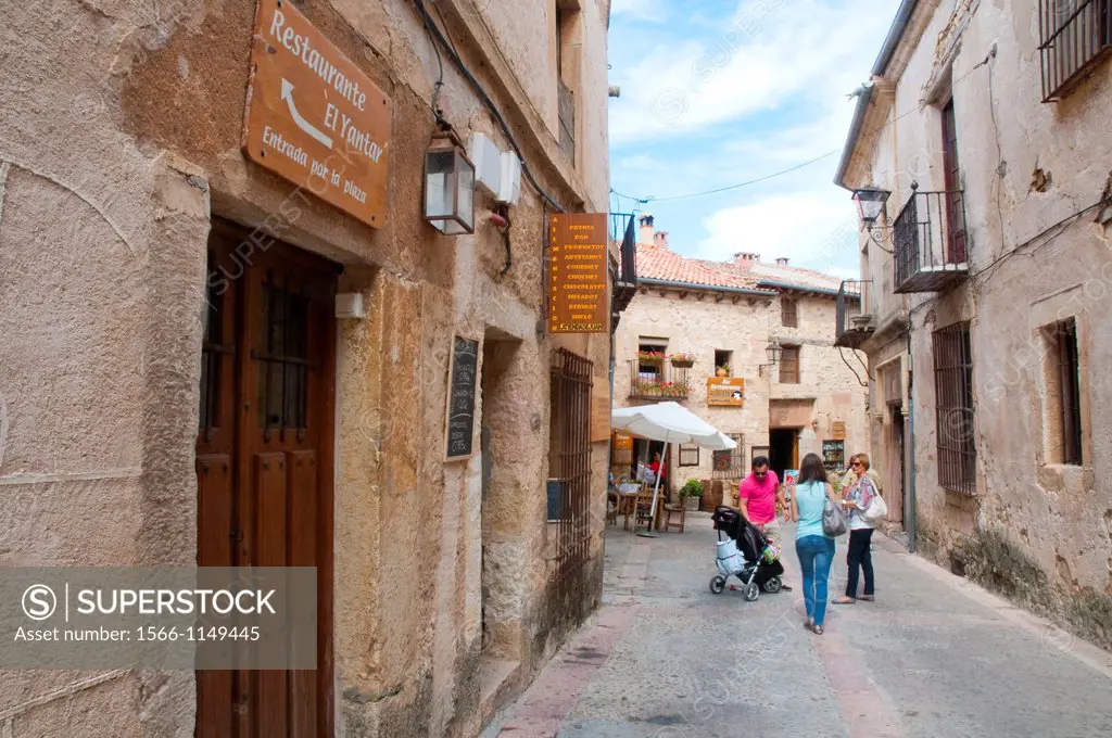 People in the street. Pedraza, Segovia province, Castilla Leon, Spain.