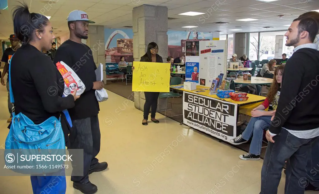 Detroit, Michigan - Students at Wayne State University discuss religion and atheism at a table set up by the Secular Student Alliance in the universit...