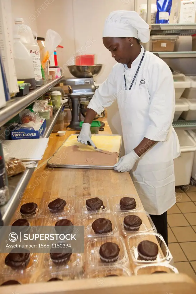 West Bloomfield, Michigan - Pastry chef Diane Smith prepares desserts for hospital patients in the kitchen of Henry Ford West Bloomfield Hospital