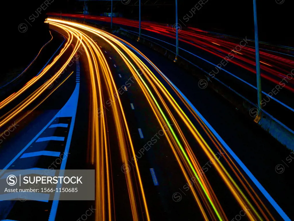 Slow motion highway car lights at night
