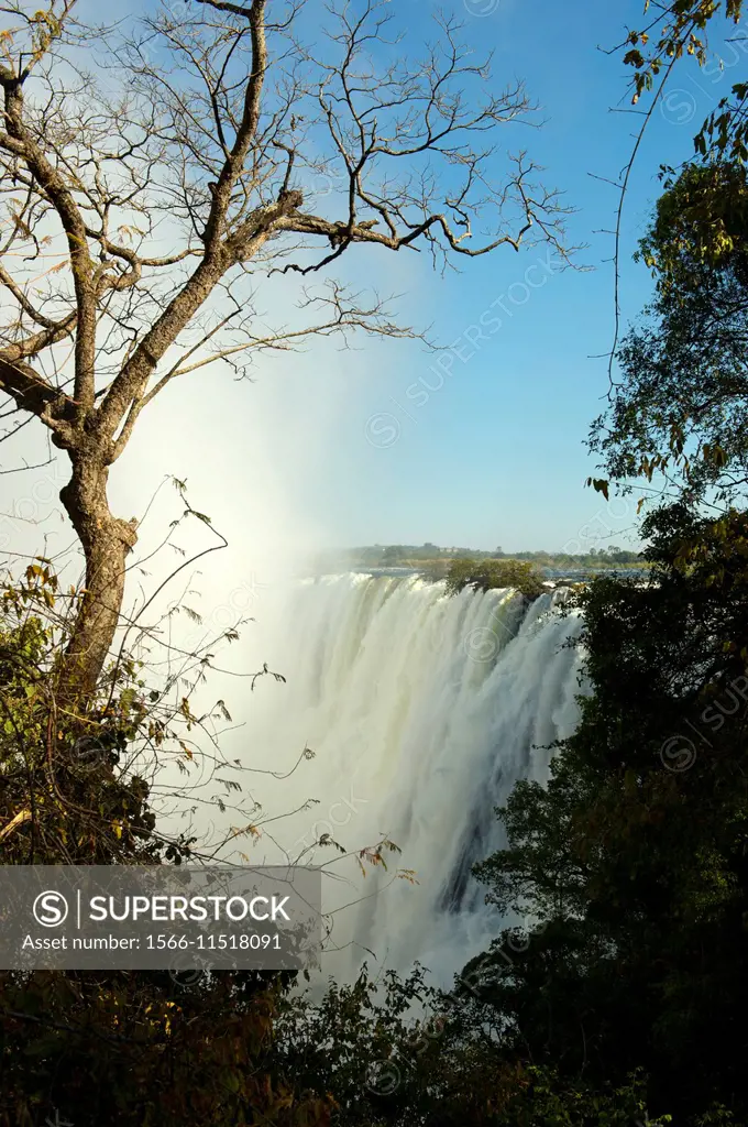 View from Zambia of Victoria Falls and the Zambezi River.
