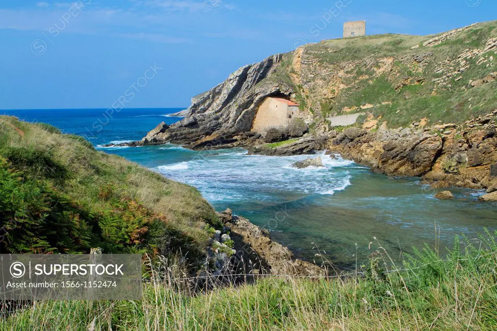 The small Santa Justa Chapel, embedded into the cliff  Santa Justa beach, Ubiarco village  Santillana del Mar  Cantabria  Spain