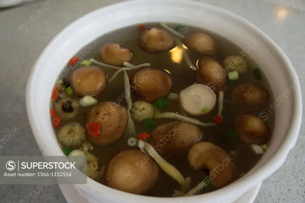 Mushrooms in hot soup. Taiwan.
