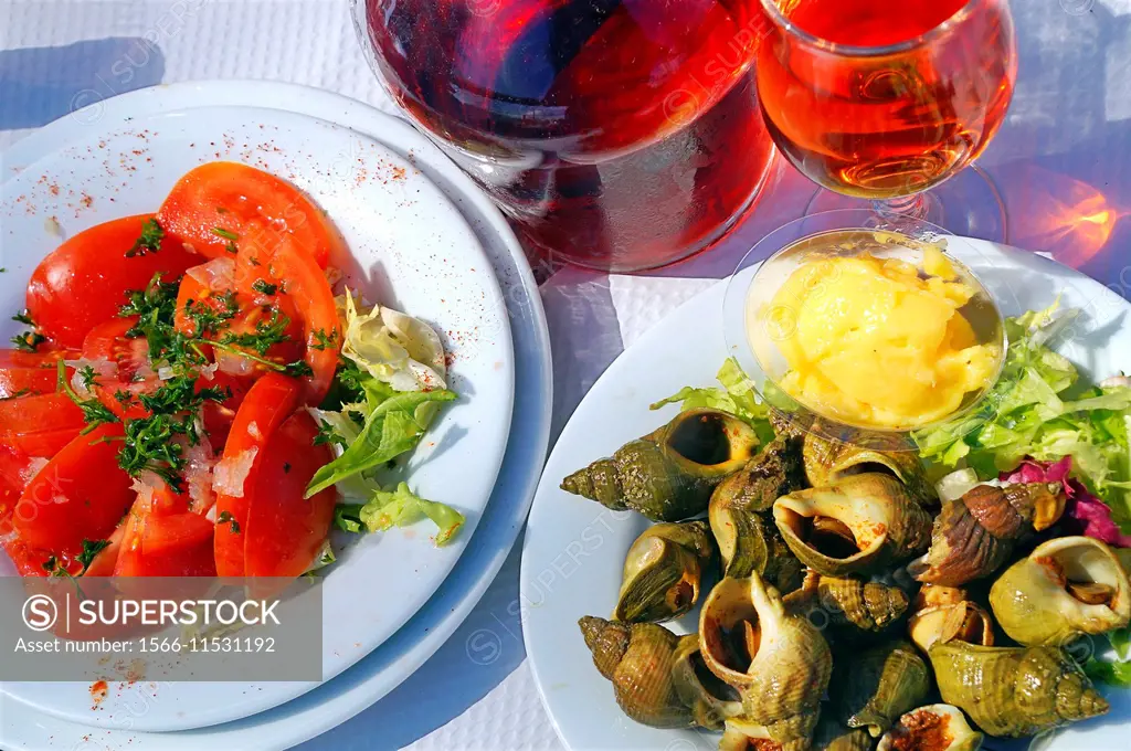 Tomatoes with vinaigrette, sea snails with mayonnaise and rosé wine, France