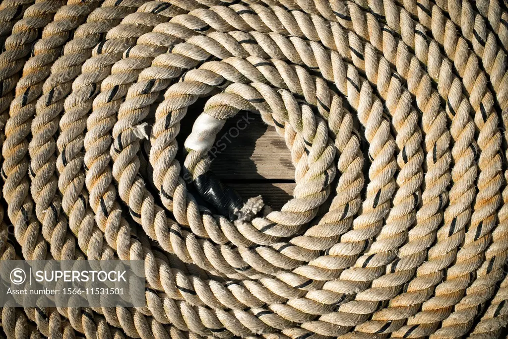 Rope rolled out on the deck of a vintage sailing boat