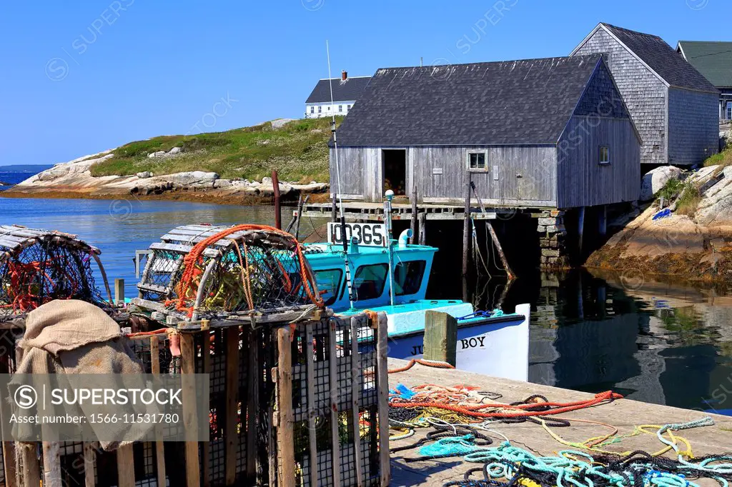 Lobster traps and fishing boats at Peggy´s Cove, Nova Scotia, Canada