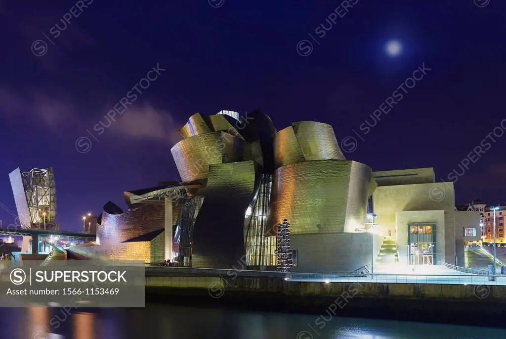 Panoramic night view of the Guggenheim museum and river Nervion, Bilbao, Biscay, Basque Country, Spain