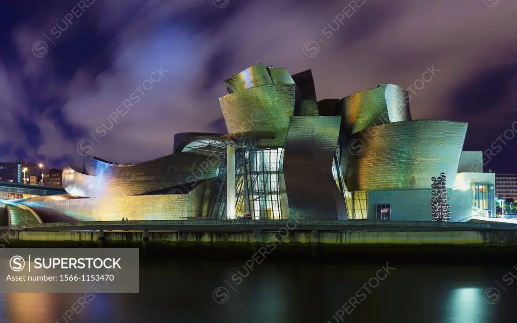 Panoramic night view of the Guggenheim museum and River Nervion, Bilbao, Biscay, Basque Country, Spain