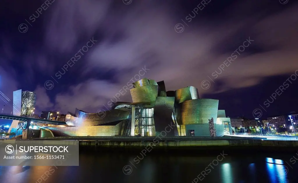 Panoramic night view of the Guggenheim museum and River Nervion, Bilbao, Biscay, Basque Country, Spain