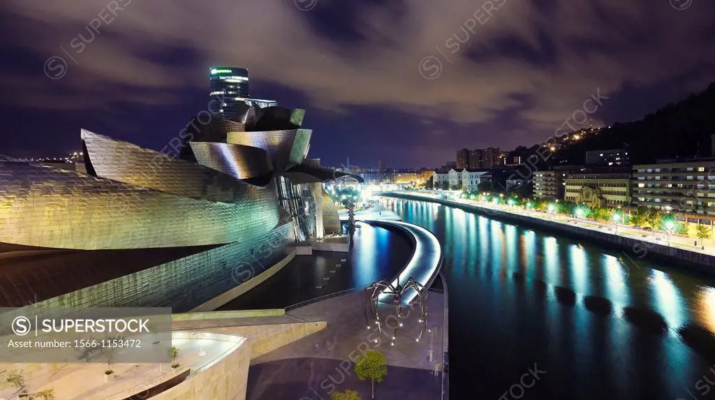 Panoramic night view from La Salve bridge of Guggenheim museum and River Nervion, Bilbao, Biscay, Basque Country, Spain