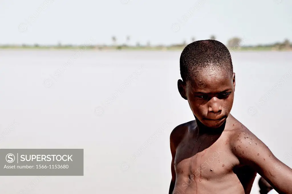 Young boy in Segou port  Segou, Mali