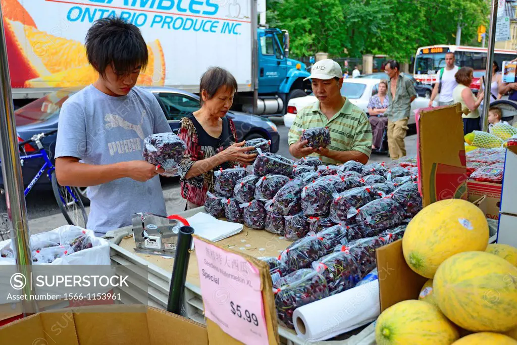 Food Vendors Chinatown Spadina Avenue Toronto Ontario Canada with colorful signs