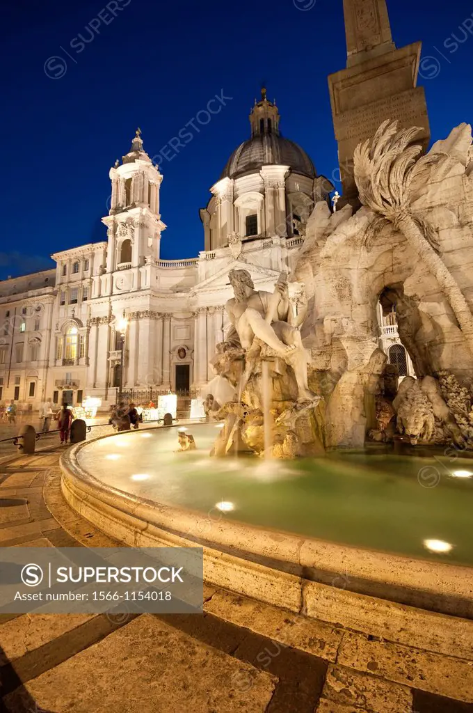 Italy, Lazio, Rome, Piazza Navona, Fountain of the Four Rivers by Bernini background Saint Angnese in Agone Church
