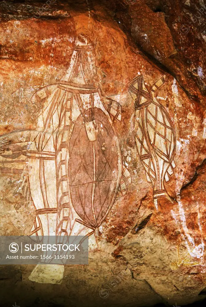 Aboriginal rock art, Nanguluwur, Kakadu, Northern Territory, Australia - artists ´Barramundi Charlie´ and ´Old Nyim´