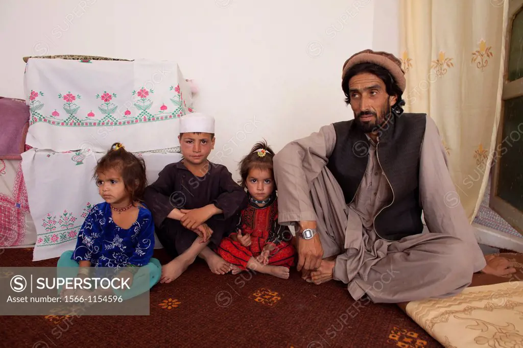 Afghan family has fled Narkh district to maidan capital of Wardak province due to fighting between taliban and Hesb-i-islami