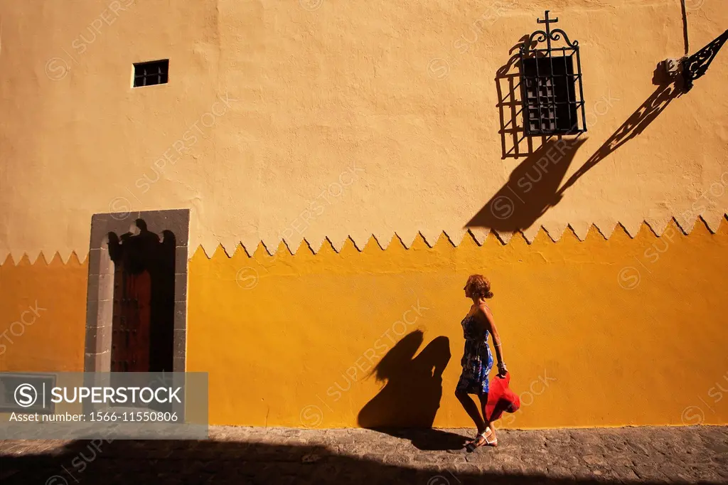 Woman walking around the Columbus House-Casa de Colon in Vegueta neighborhood, Las Palmas de Gran Canaria, Canary Islands, Spain, Europe.