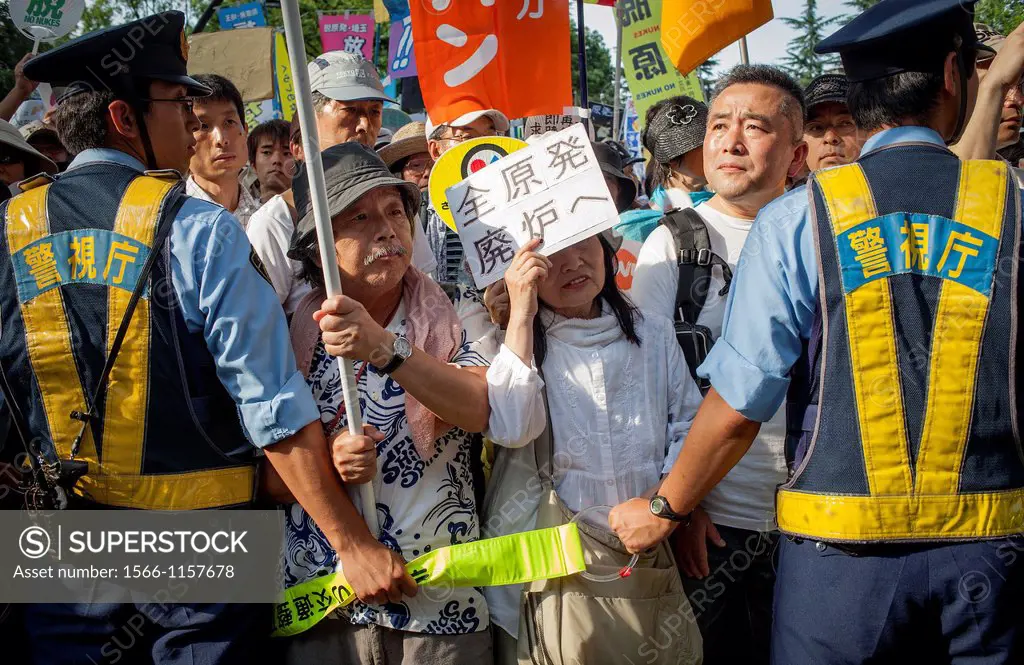 Anti-nuclear demonstration in the center of town near the headquarters of Japan´s Government Kokkai or Diet Tokyo Japan
