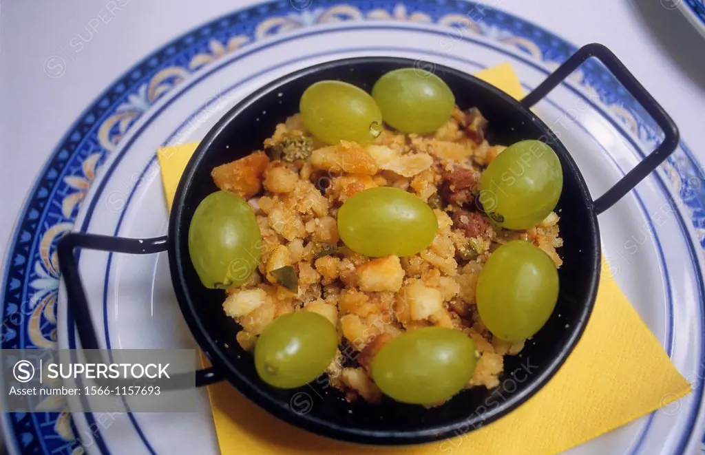 `Migas manchegas´,Venta del Quijote,famous typical restaurant ,traditional cuisine,Puerto Lápice, province of Ciudad Real, Castilla la Mancha,the rout...