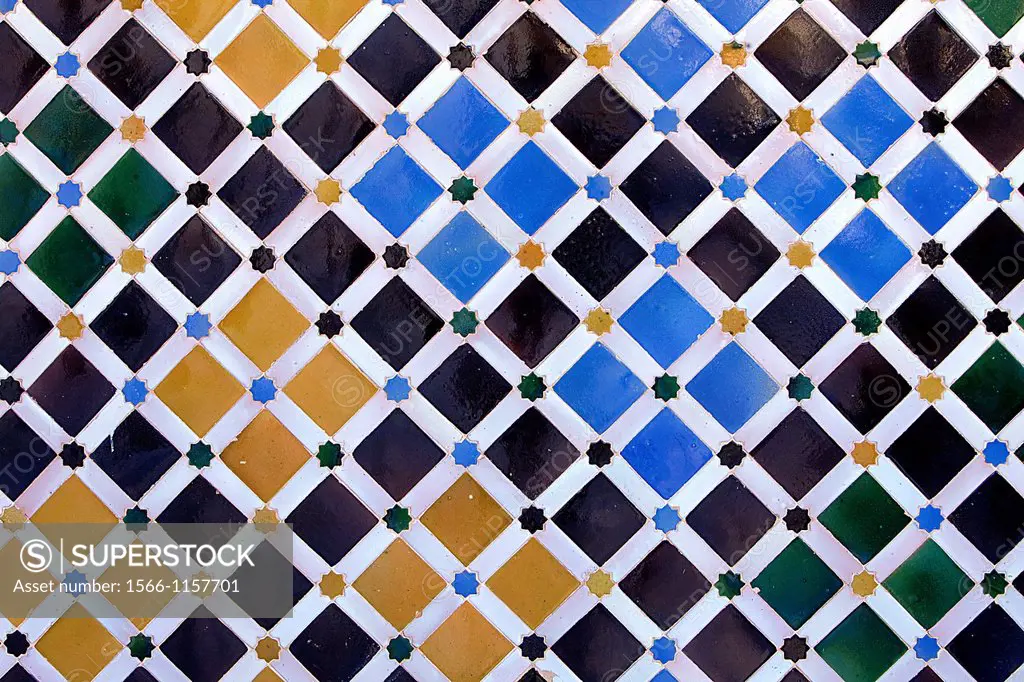 Detail of tiles in`Patio de los Arrayanes´, Courtyard of the Myrtles, Comares Palace, Nazaries palaces, Alhambra, Granada, Andalusia, Spain