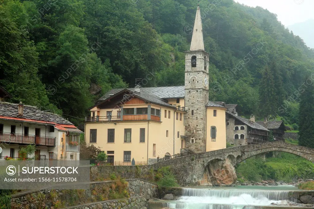 bridge on the river Lys and parish of Fontainemore in the Gressoney valley. Italy.
