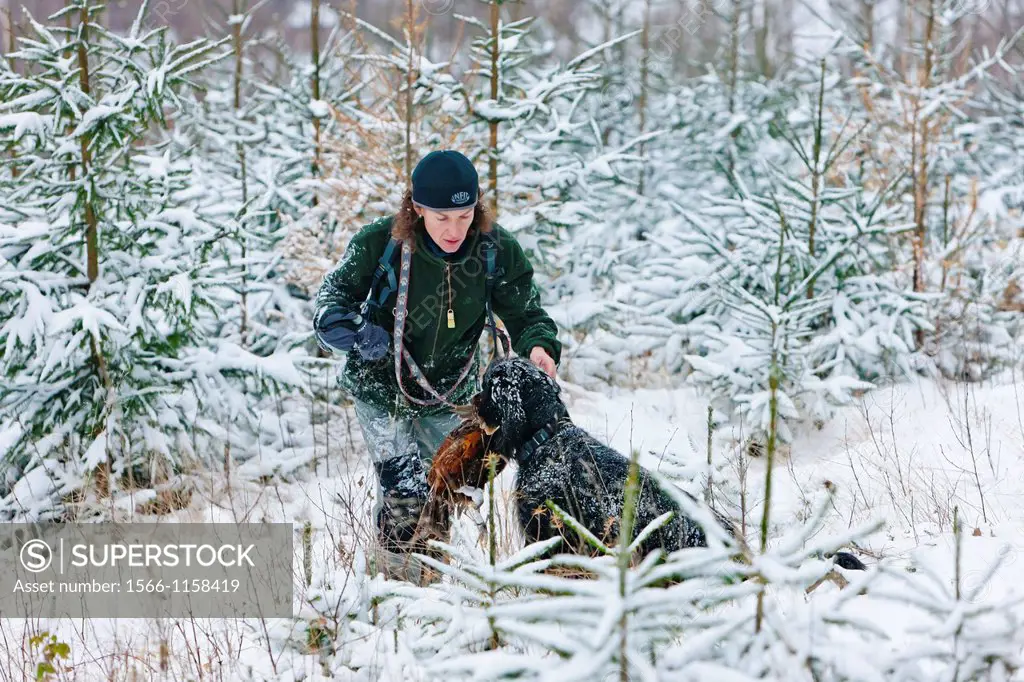 hunter with a dog at hunt