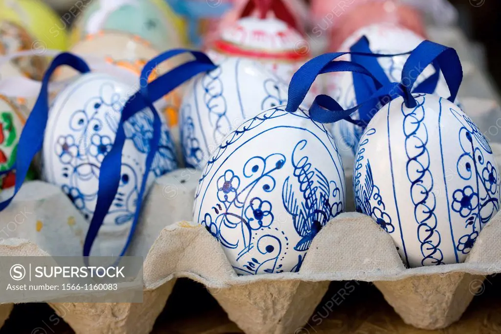 Blue and white onion pattern eggs in flat of colored eggs  Hand painted Easter eggs in public market  Hand painted, decorated Easter eggs flood the Pr...