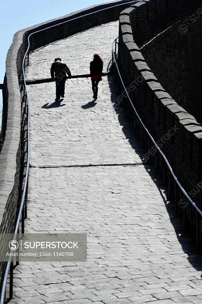 Chinese and foreign Visitors are walking are walking on the Great Wall of China