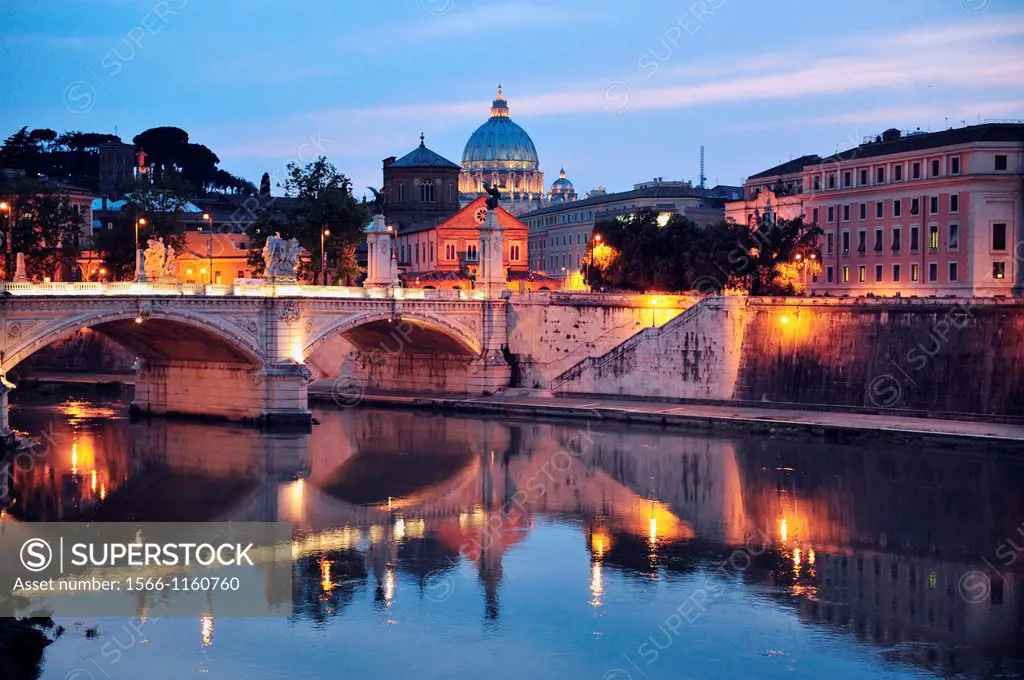 Sant´ Angelo Bridge and Basilica of St  Peter at night with the Vatican in the background in Rome, Italy