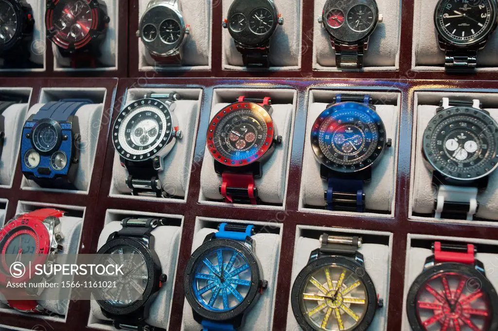 A display of hip-hop style watches with over-sized faces is seen in the window of a wholesale jewelry store in New York