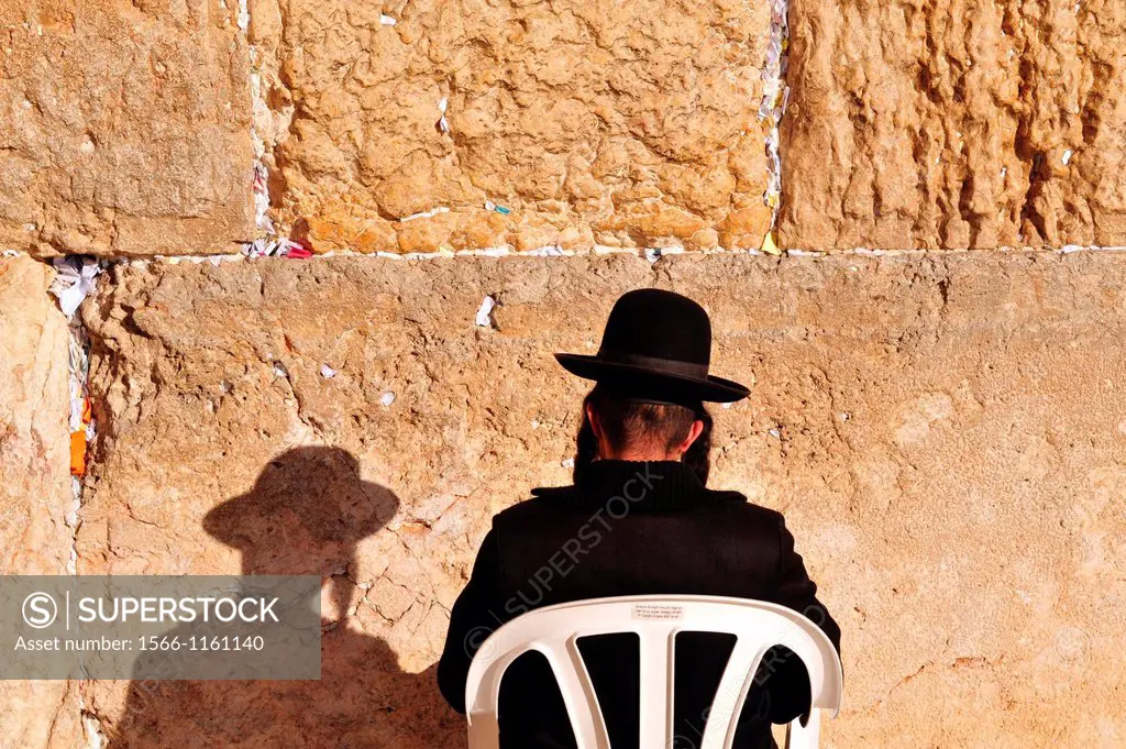 A Jewish orthodox man prays at the Western Wall in the old city of Jerusalem, Israel