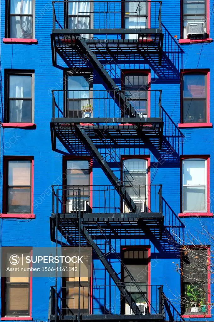 A fire escape of the facade of an apartment building in Manhattan in New York city