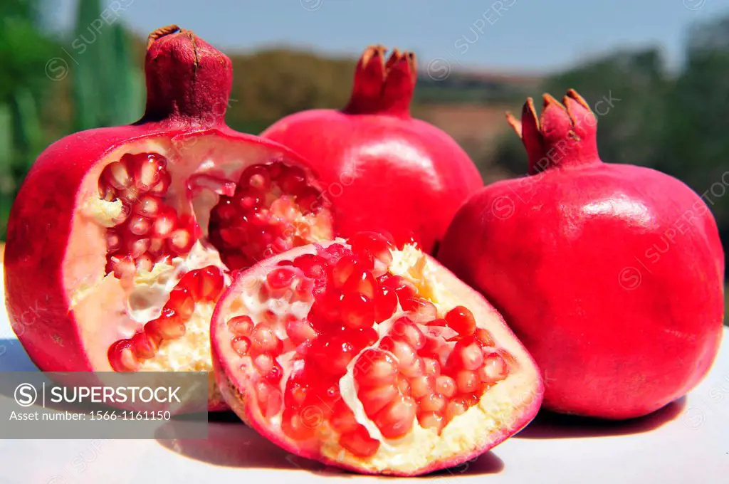 Pomegranate fruit with pips in an outdoor setting - Jewish new year symbols