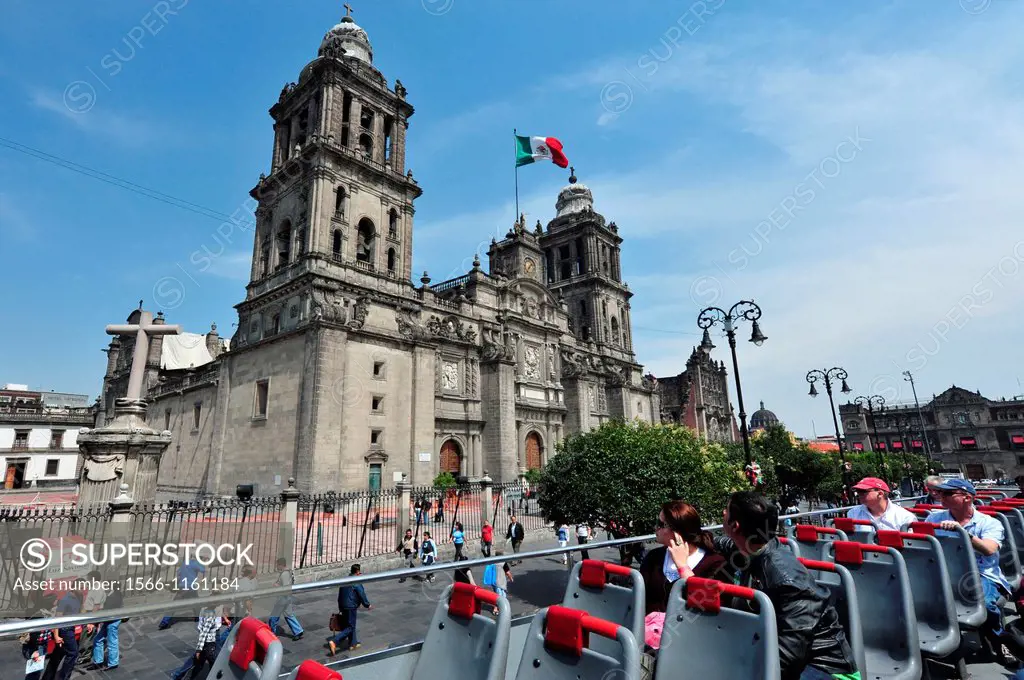 Tourist on a double decker bus rooftop looking at Catedral Metropolitana mexico city Rafael Ben-Ari/Chameleons Eye