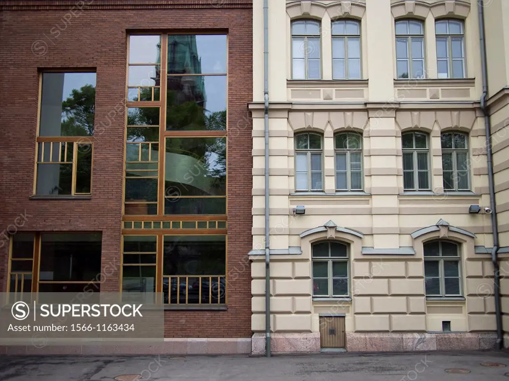 Old and new building facades, side by side in Helsinki, Finland
