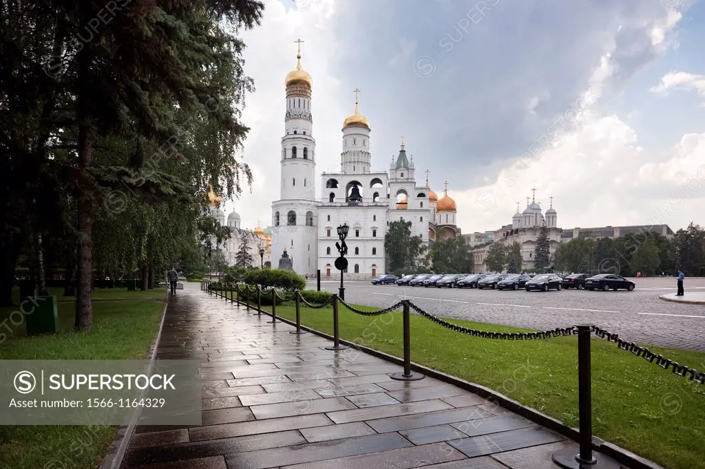 Moscow, Russia-July 20, 2010  Many tourists visit the Kremlin and Belfry of Ivan the Great each year where they mix with official cars and policeman