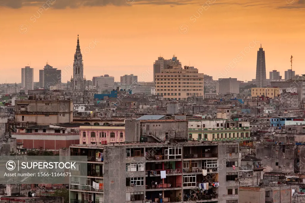 Cuba, Havana, elevated city view above Central Havana looking west, dusk