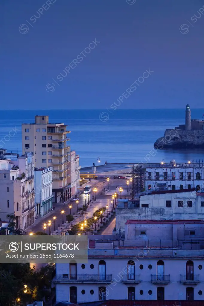 Cuba, Havana, elevated city view above Paseo de Marti towards Castillo de los Tres Santos Reyes del Morro, dawn