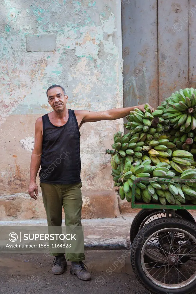 Cuba, Havana, Havana Vieja, banana seller, NR