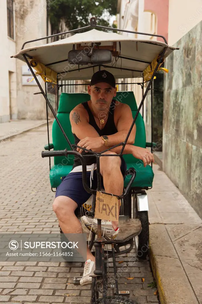 Cuba, Havana, Havana Vieja, pedal taxi driver, NR