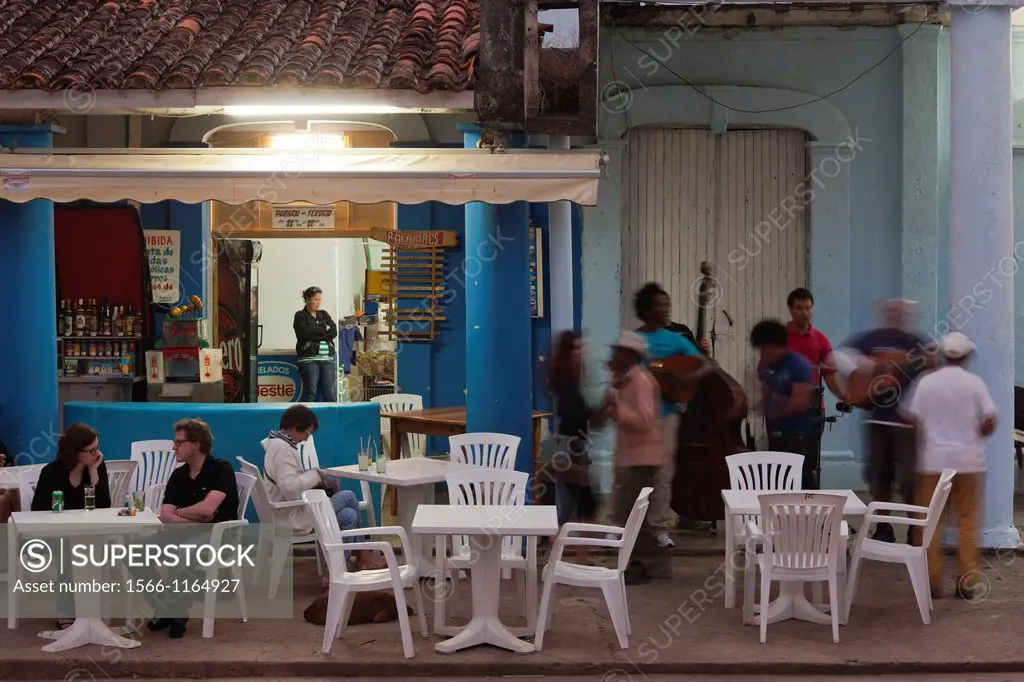 Cuba, Pinar del Rio Province, Vinales, Vinales Valley, outdoor cafe-bar, dusk