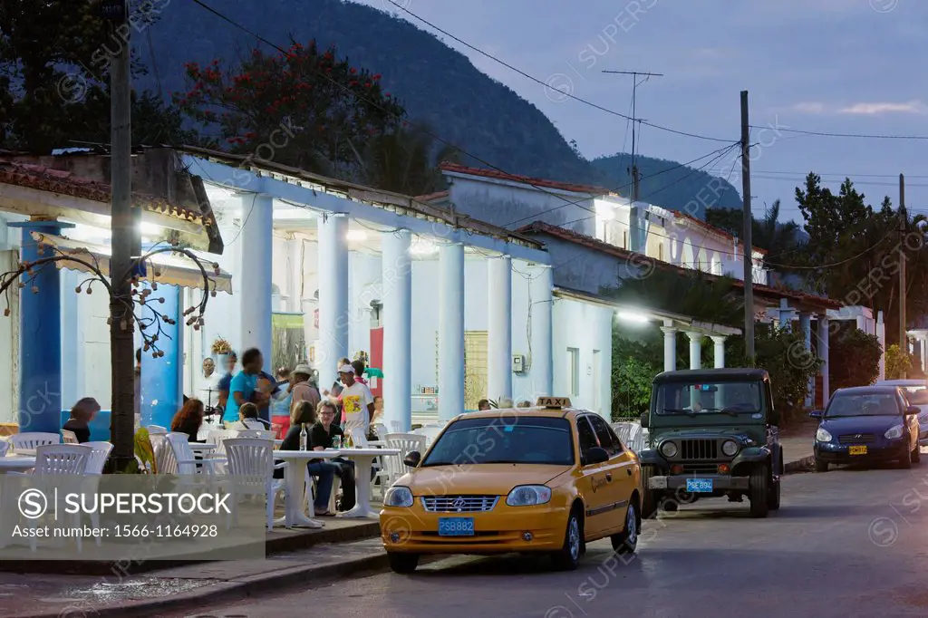 Cuba, Pinar del Rio Province, Vinales, Vinales Valley, outdoor cafe-bar, dusk