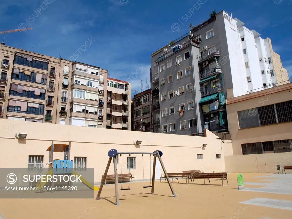 Children´s playset, empty playground, buildings. Barcelona, Catalonia, Spain.
